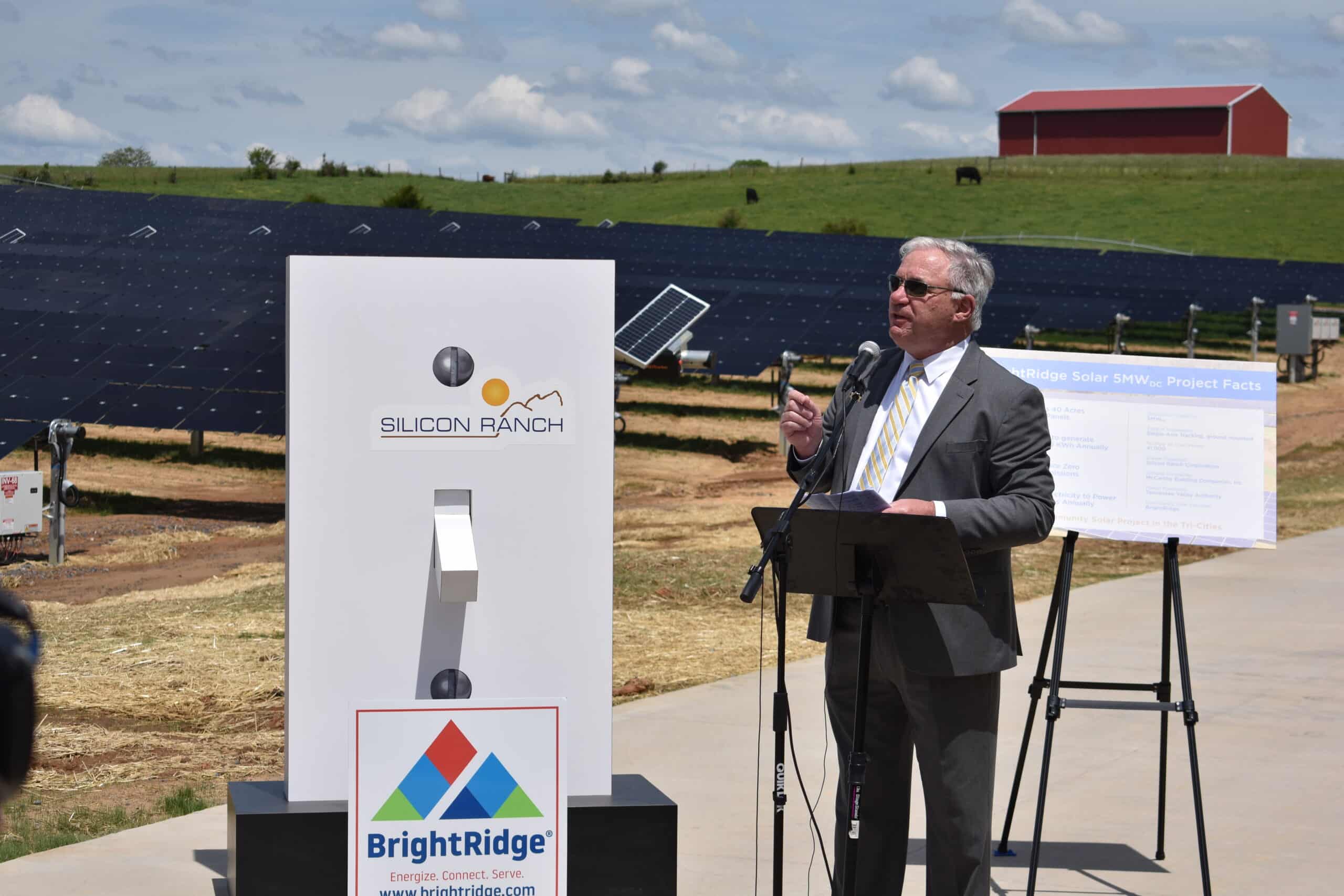 Jim Bausell speaking at "Flip the Switch" event for BridgeRight